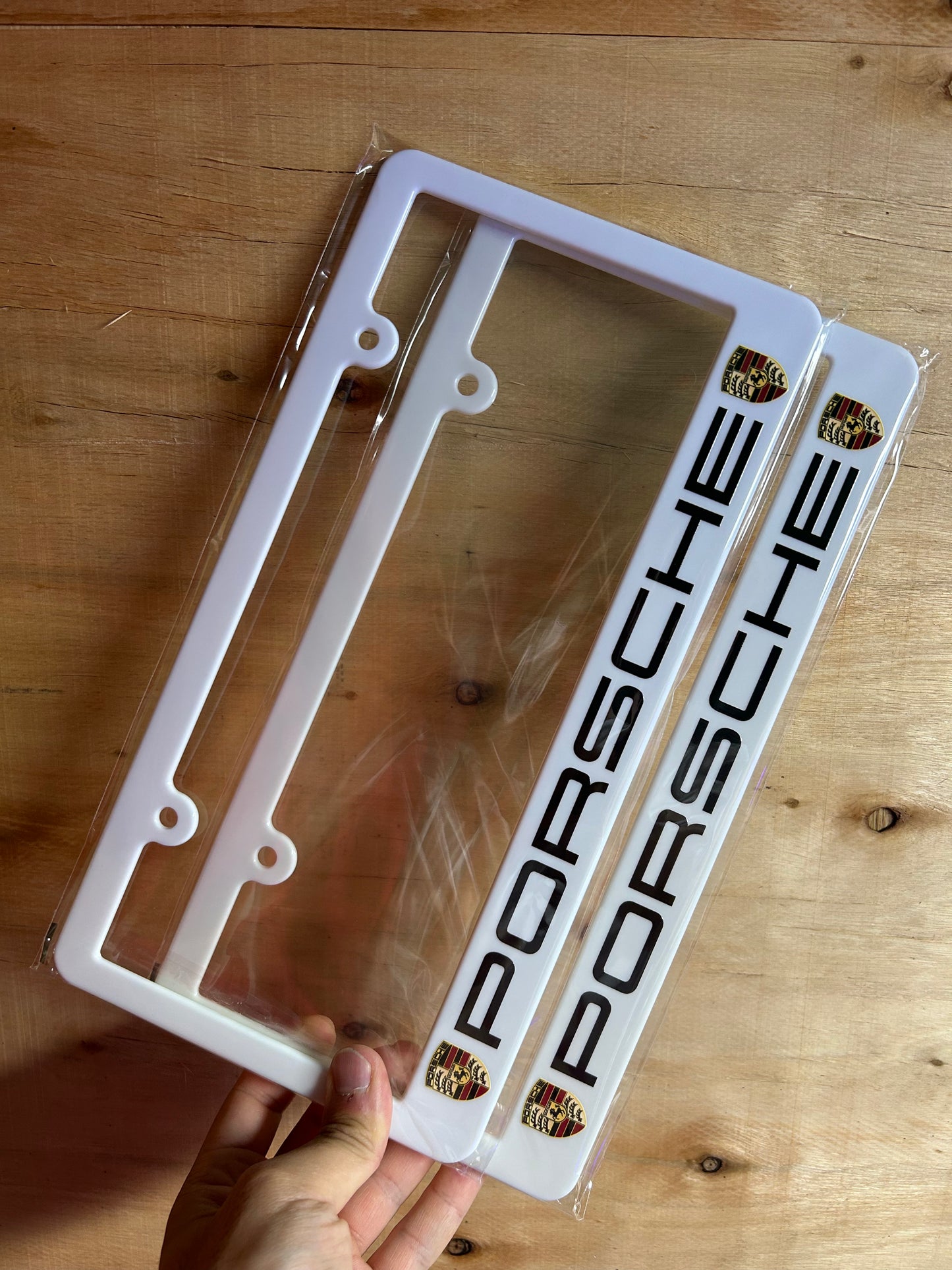 Porsche logo white license plate frame set (2pcs)